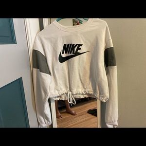 Woman’s large white Nike half shirt